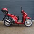 te koop : Honda SH125 van 2022, slechts 3644km, topcase, garantie