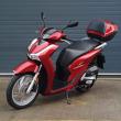 te koop : Honda SH125 van 2022, slechts 3644km, topcase, garantie
